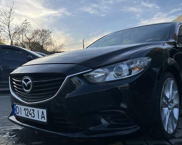 Черный Мазда 6, объемом двигателя 2.49 л и пробегом 128 тыс. км за 11900 $, фото 1 на Automoto.ua