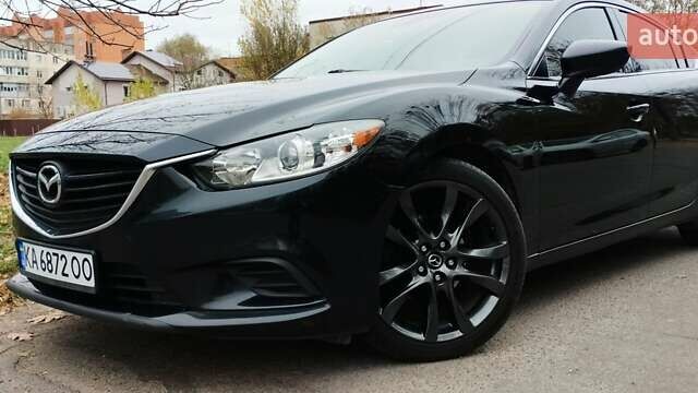 Черный Мазда 6, объемом двигателя 2.49 л и пробегом 175 тыс. км за 10950 $, фото 1 на Automoto.ua