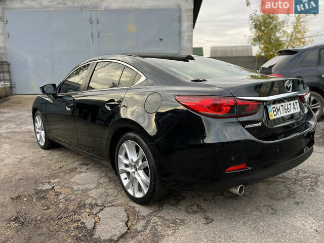Черный Мазда 6, объемом двигателя 2.49 л и пробегом 135 тыс. км за 14500 $, фото 1 на Automoto.ua