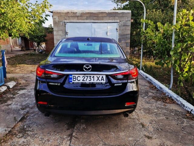 Черный Мазда 6, объемом двигателя 2.5 л и пробегом 206 тыс. км за 10969 $, фото 1 на Automoto.ua