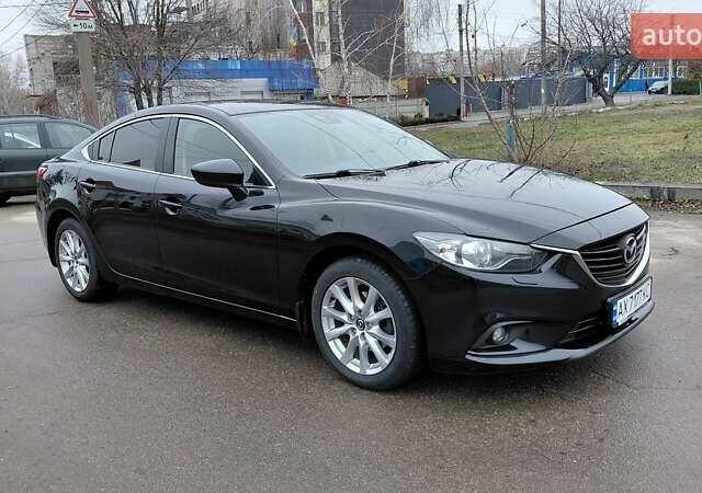 Черный Мазда 6, объемом двигателя 2.49 л и пробегом 94 тыс. км за 12850 $, фото 1 на Automoto.ua