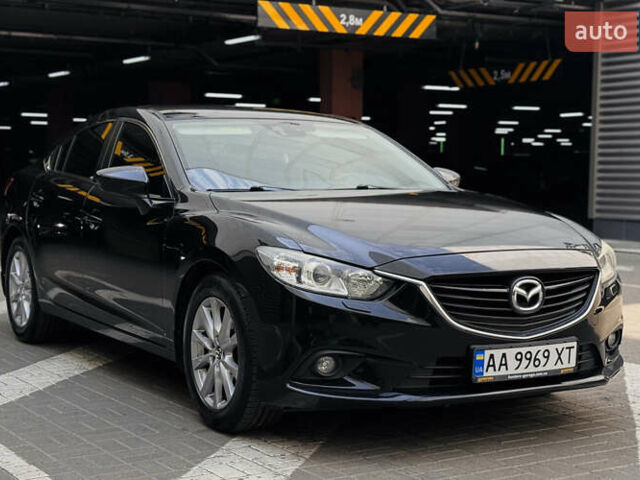 Черный Мазда 6, объемом двигателя 2 л и пробегом 148 тыс. км за 10900 $, фото 1 на Automoto.ua
