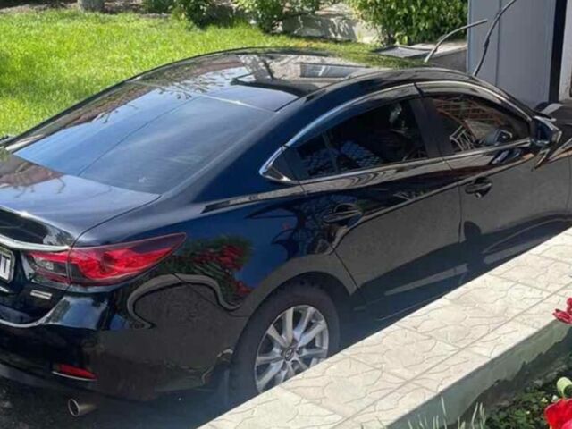 Черный Мазда 6, объемом двигателя 2 л и пробегом 133 тыс. км за 14000 $, фото 1 на Automoto.ua