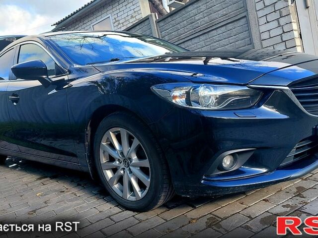 Черный Мазда 6, объемом двигателя 2.5 л и пробегом 94 тыс. км за 12900 $, фото 1 на Automoto.ua