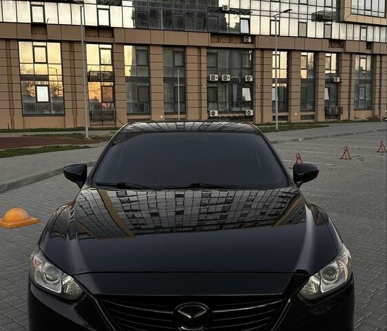 Черный Мазда 6, объемом двигателя 2.4 л и пробегом 190 тыс. км за 9900 $, фото 1 на Automoto.ua