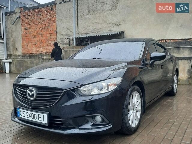 Черный Мазда 6, объемом двигателя 2 л и пробегом 190 тыс. км за 11550 $, фото 1 на Automoto.ua