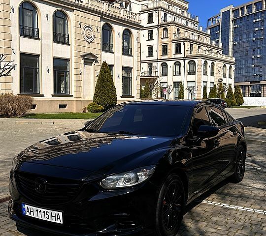 Черный Мазда 6, объемом двигателя 2.4 л и пробегом 190 тыс. км за 10700 $, фото 1 на Automoto.ua