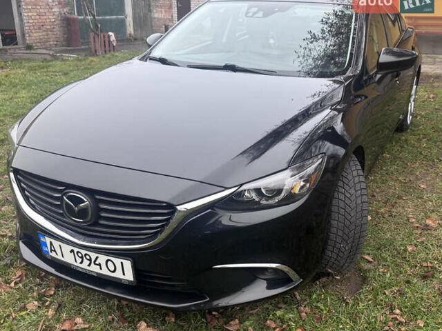 Черный Мазда 6, объемом двигателя 2.49 л и пробегом 178 тыс. км за 11900 $, фото 1 на Automoto.ua