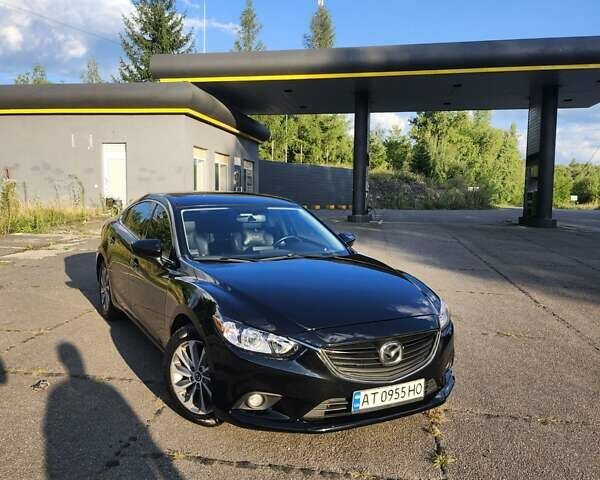 Черный Мазда 6, объемом двигателя 2.49 л и пробегом 240 тыс. км за 10750 $, фото 1 на Automoto.ua