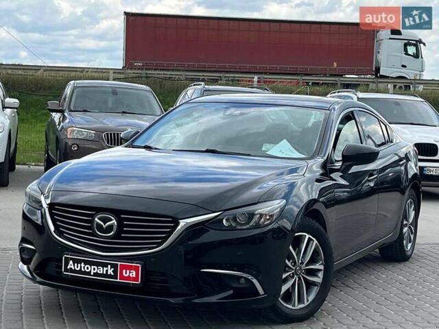 Черный Мазда 6, объемом двигателя 2.2 л и пробегом 178 тыс. км за 15990 $, фото 1 на Automoto.ua