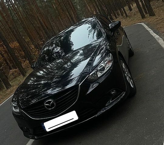 Черный Мазда 6, объемом двигателя 2.49 л и пробегом 180 тыс. км за 14800 $, фото 1 на Automoto.ua