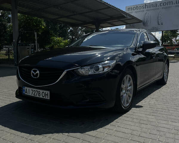 Черный Мазда 6, объемом двигателя 2.49 л и пробегом 217 тыс. км за 10900 $, фото 1 на Automoto.ua