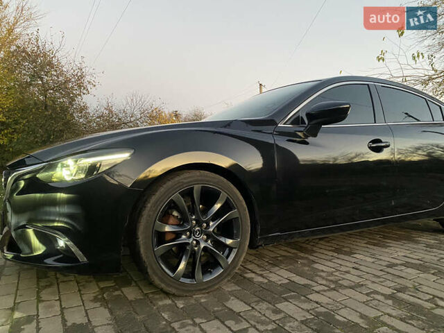 Черный Мазда 6, объемом двигателя 2.5 л и пробегом 154 тыс. км за 12000 $, фото 1 на Automoto.ua