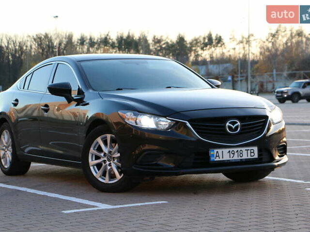 Черный Мазда 6, объемом двигателя 2.5 л и пробегом 179 тыс. км за 11700 $, фото 1 на Automoto.ua