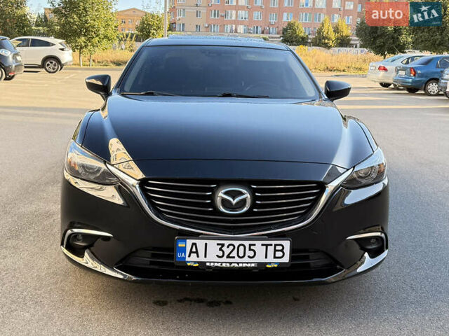 Черный Мазда 6, объемом двигателя 2.49 л и пробегом 174 тыс. км за 15950 $, фото 1 на Automoto.ua