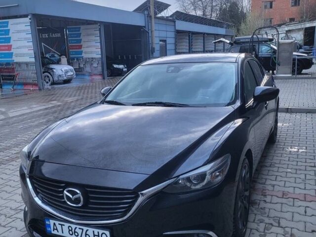 Черный Мазда 6, объемом двигателя 2.49 л и пробегом 156 тыс. км за 13500 $, фото 1 на Automoto.ua