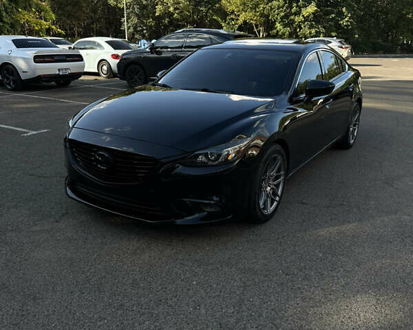 Черный Мазда 6, объемом двигателя 2.5 л и пробегом 200 тыс. км за 15600 $, фото 1 на Automoto.ua