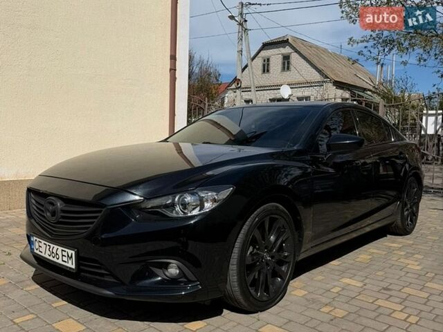Черный Мазда 6, объемом двигателя 2.49 л и пробегом 178 тыс. км за 12700 $, фото 1 на Automoto.ua