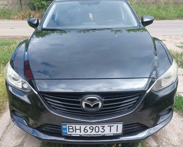Черный Мазда 6, объемом двигателя 2.49 л и пробегом 103 тыс. км за 13500 $, фото 1 на Automoto.ua