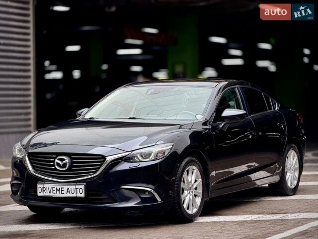 Черный Мазда 6, объемом двигателя 2.19 л и пробегом 156 тыс. км за 12800 $, фото 1 на Automoto.ua