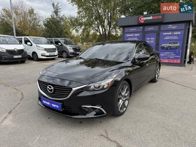 Черный Мазда 6, объемом двигателя 2.49 л и пробегом 190 тыс. км за 14900 $, фото 1 на Automoto.ua