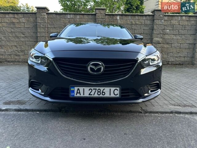 Черный Мазда 6, объемом двигателя 2.49 л и пробегом 172 тыс. км за 11400 $, фото 1 на Automoto.ua