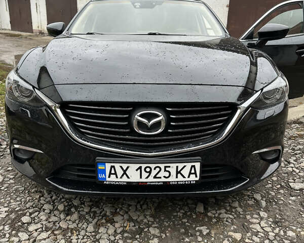 Черный Мазда 6, объемом двигателя 2.2 л и пробегом 160 тыс. км за 14300 $, фото 1 на Automoto.ua