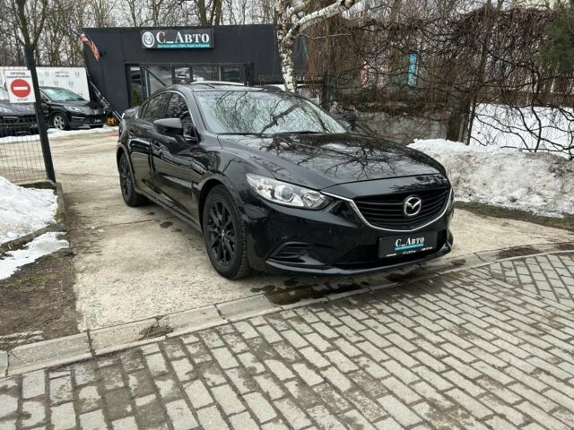 Черный Мазда 6, объемом двигателя 2.5 л и пробегом 208 тыс. км за 12100 $, фото 1 на Automoto.ua