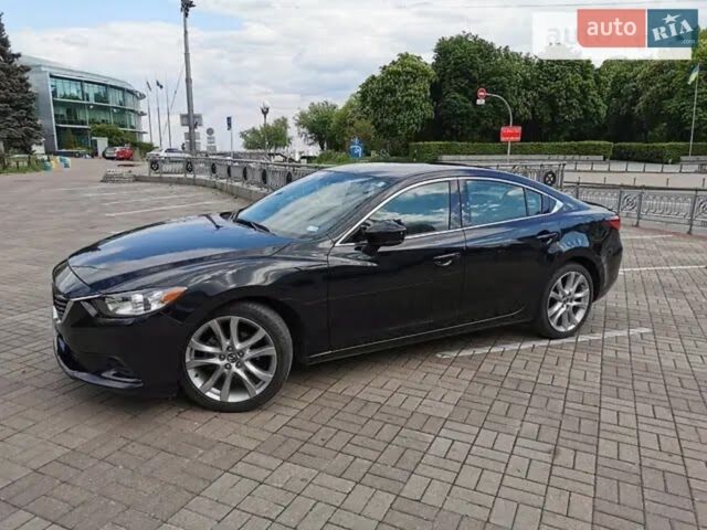 Черный Мазда 6, объемом двигателя 2.49 л и пробегом 150 тыс. км за 13500 $, фото 1 на Automoto.ua