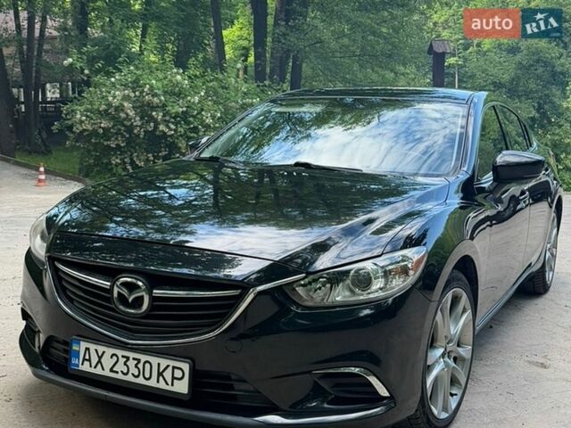 Черный Мазда 6, объемом двигателя 2.49 л и пробегом 130 тыс. км за 12500 $, фото 1 на Automoto.ua