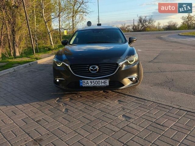 Черный Мазда 6, объемом двигателя 2.49 л и пробегом 198 тыс. км за 13700 $, фото 1 на Automoto.ua