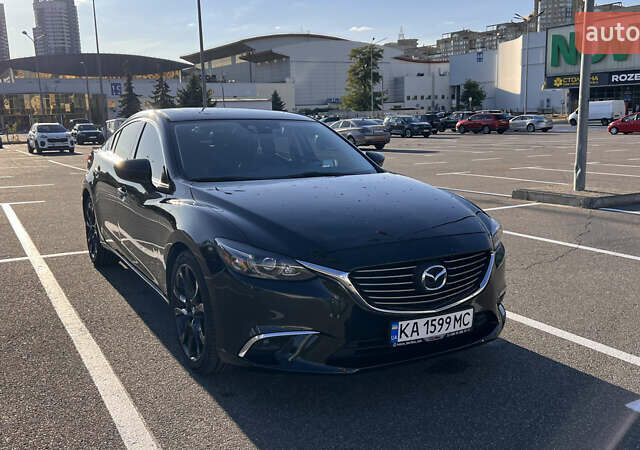 Черный Мазда 6, объемом двигателя 2.49 л и пробегом 156 тыс. км за 14900 $, фото 1 на Automoto.ua