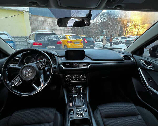 Черный Мазда 6, объемом двигателя 2.49 л и пробегом 207 тыс. км за 11500 $, фото 1 на Automoto.ua