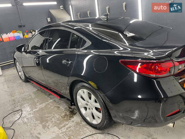 Черный Мазда 6, объемом двигателя 2.49 л и пробегом 244 тыс. км за 13500 $, фото 1 на Automoto.ua