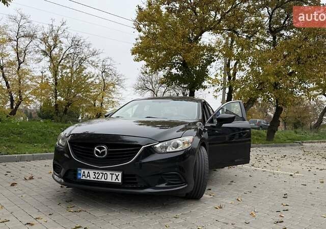 Черный Мазда 6, объемом двигателя 2.49 л и пробегом 129 тыс. км за 12500 $, фото 1 на Automoto.ua