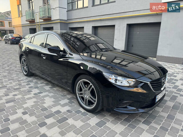 Чорний Мазда 6, об'ємом двигуна 2.49 л та пробігом 64 тис. км за 14000 $, фото 1 на Automoto.ua