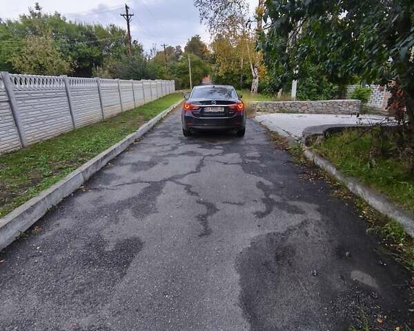 Чорний Мазда 6, об'ємом двигуна 2.49 л та пробігом 198 тис. км за 14000 $, фото 1 на Automoto.ua