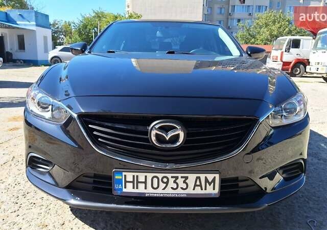 Черный Мазда 6, объемом двигателя 2.49 л и пробегом 185 тыс. км за 13000 $, фото 1 на Automoto.ua
