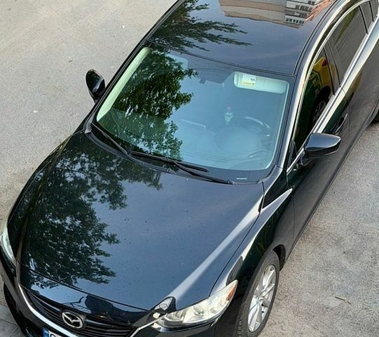 Чорний Мазда 6, об'ємом двигуна 2.49 л та пробігом 137 тис. км за 12900 $, фото 1 на Automoto.ua