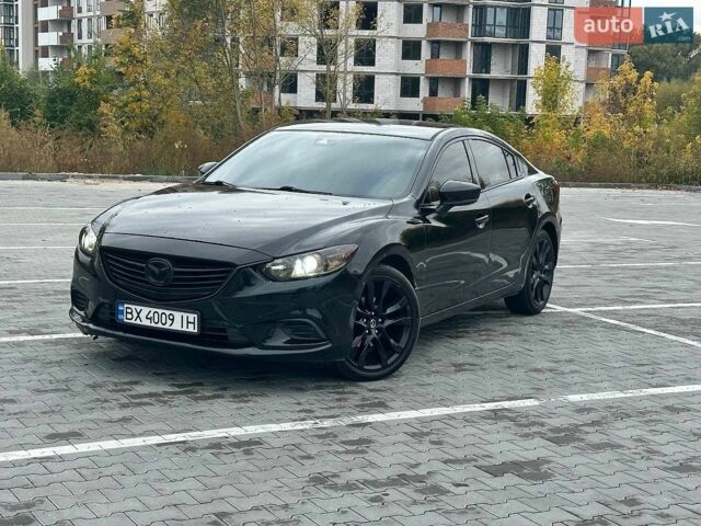 Черный Мазда 6, объемом двигателя 2.49 л и пробегом 201 тыс. км за 12800 $, фото 1 на Automoto.ua