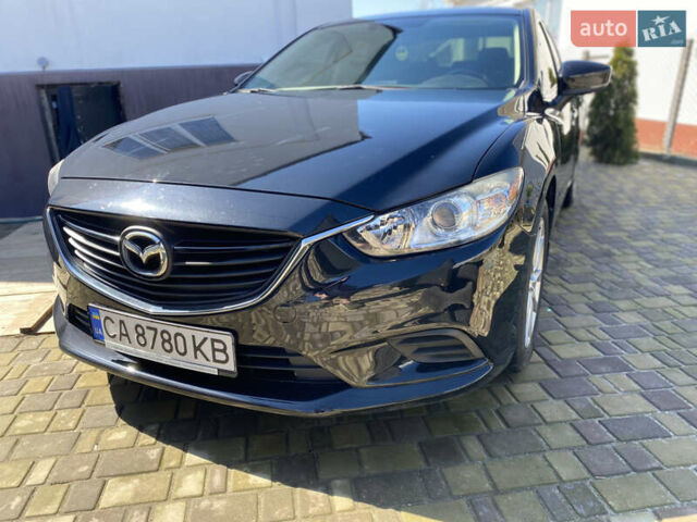 Черный Мазда 6, объемом двигателя 2.49 л и пробегом 135 тыс. км за 13500 $, фото 1 на Automoto.ua