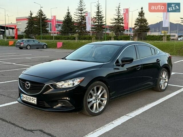 Черный Мазда 6, объемом двигателя 2.49 л и пробегом 91 тыс. км за 15000 $, фото 1 на Automoto.ua