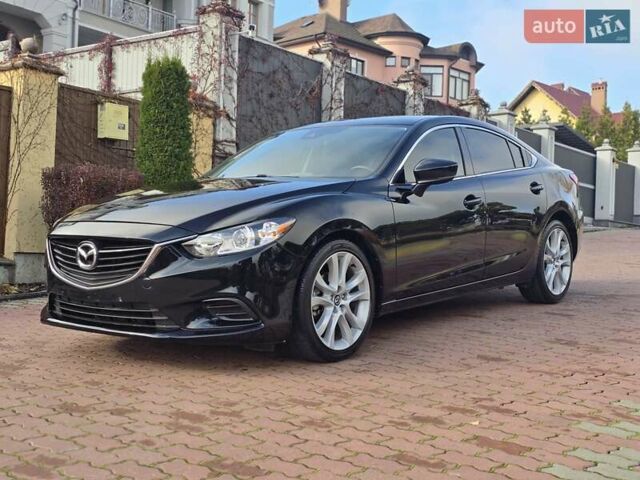 Черный Мазда 6, объемом двигателя 2.5 л и пробегом 70 тыс. км за 12800 $, фото 1 на Automoto.ua