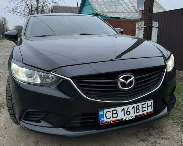 Черный Мазда 6, объемом двигателя 2.49 л и пробегом 88 тыс. км за 13000 $, фото 1 на Automoto.ua