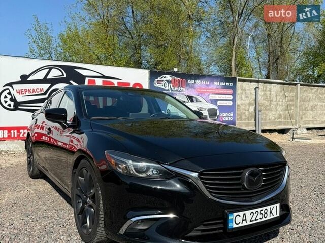 Черный Мазда 6, объемом двигателя 2.49 л и пробегом 136 тыс. км за 16300 $, фото 1 на Automoto.ua