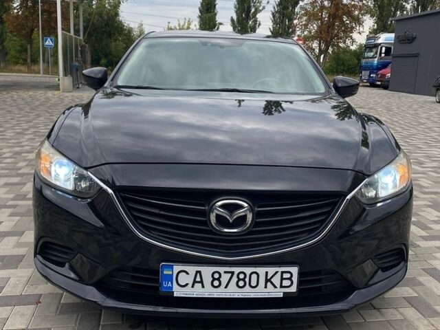 Черный Мазда 6, объемом двигателя 2.49 л и пробегом 137 тыс. км за 12800 $, фото 1 на Automoto.ua