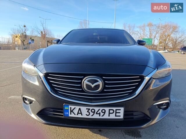 Черный Мазда 6, объемом двигателя 2.49 л и пробегом 148 тыс. км за 14200 $, фото 1 на Automoto.ua