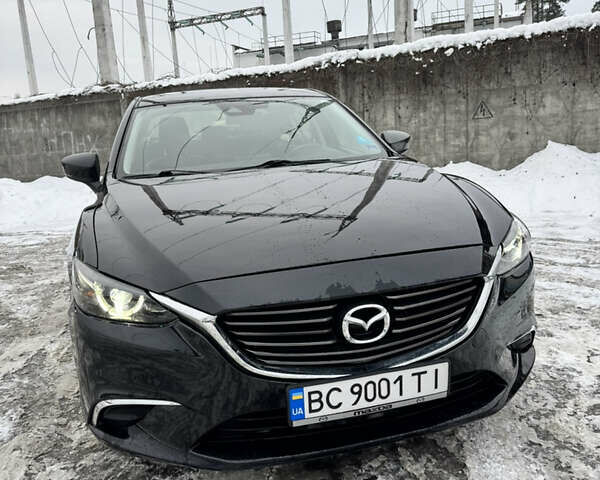 Черный Мазда 6, объемом двигателя 2.49 л и пробегом 141 тыс. км за 12500 $, фото 1 на Automoto.ua