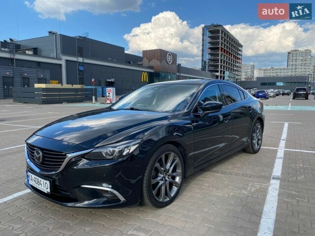Черный Мазда 6, объемом двигателя 2.49 л и пробегом 171 тыс. км за 16500 $, фото 1 на Automoto.ua