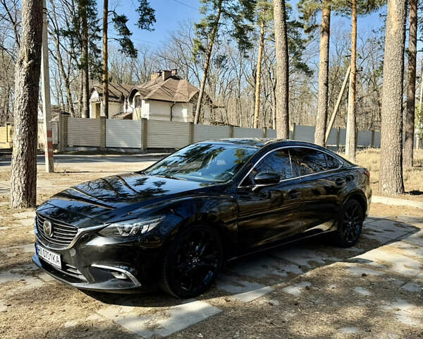 Черный Мазда 6, объемом двигателя 2.49 л и пробегом 124 тыс. км за 14700 $, фото 1 на Automoto.ua